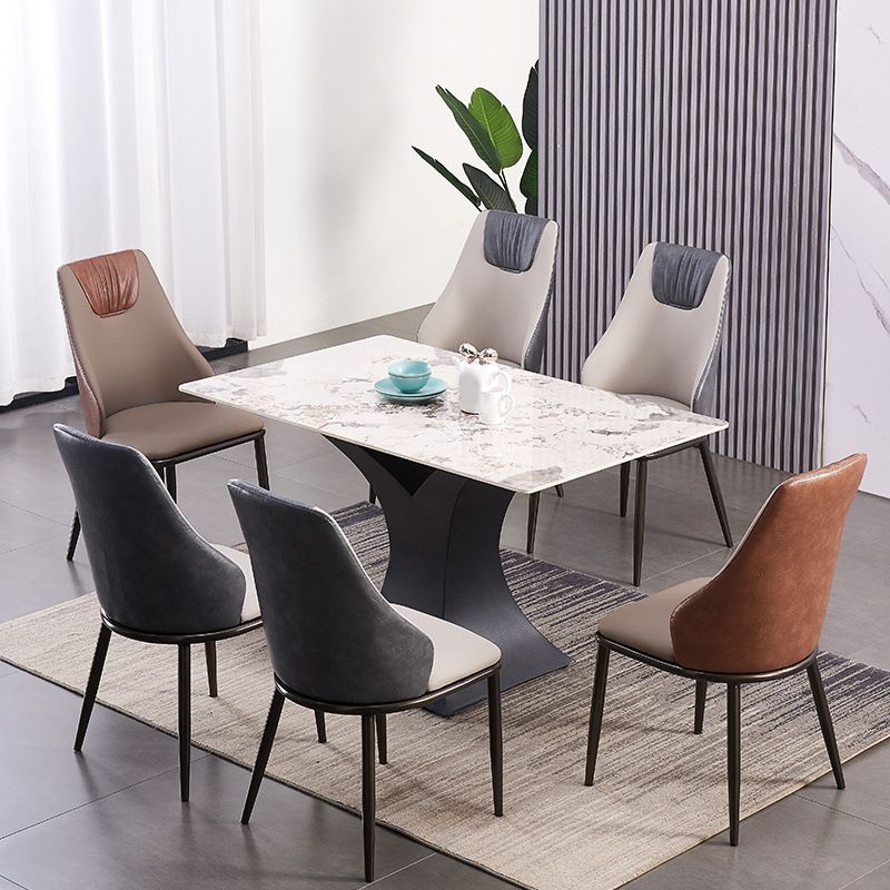 Moderne Metallflügelback -Stuhl -Leder -Essstühle mit schwarzen Beinen
