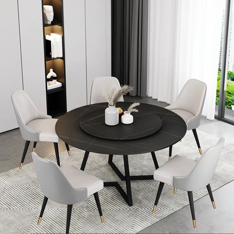 Mesa de comedor de piedra sinterizada Mesa de comedor moderna redonda con marco negro