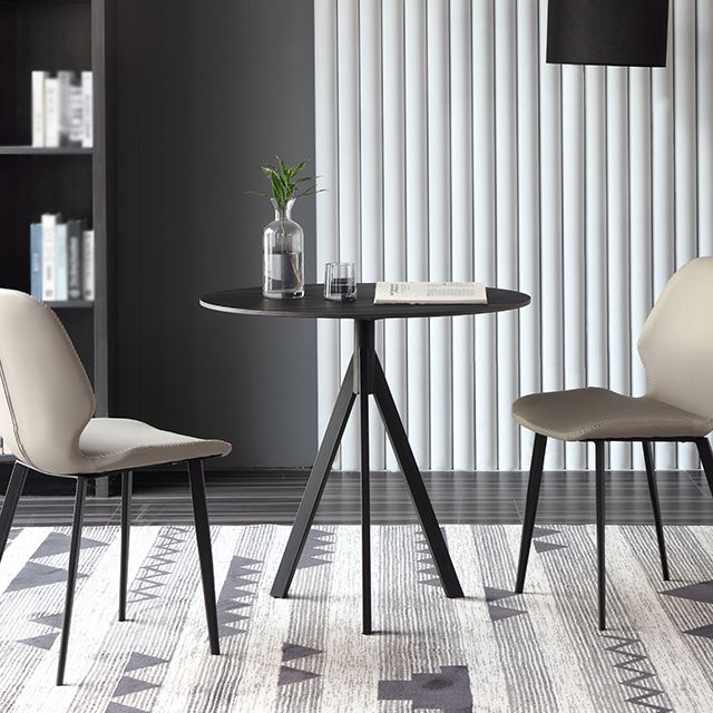 Moderne stijl gesinterde stenen eettafel zwarte ronde tafel met 3 poten
