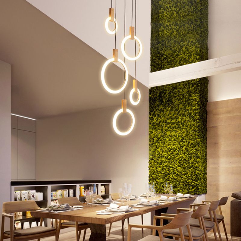 Enclaceur de cercles en bois massif pendentif