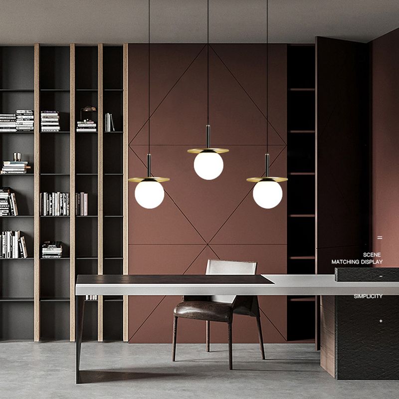 7" Wide White Glass Globe Mini Hanging Light with Round Metal Sheet Decoration Post-modern Style Simplicity Lighting Pendant in Gold