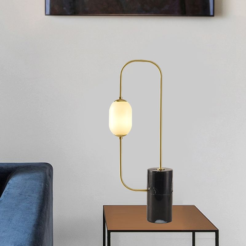 Designador de lámpara de mesita de noche de circuito iluminación de mesa negra y dorada de vidrio mate con base de mármol de cilindro