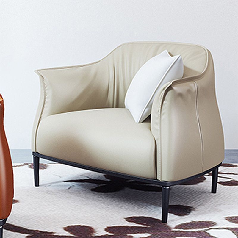 Solid Color Genuine Leather Arms Included with Black Legs Round Arms Barrel Chair