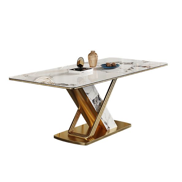 Mesa de comedor de piedra sinterizada de estilo moderno con mesa fija blanca y base de caballete para uso en el hogar