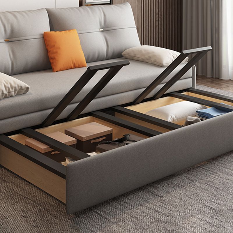 Glam Grey Futon Sleeper Sofa with Tufted Back and Storage in Faux Leather