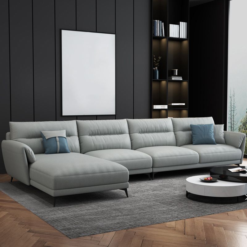 Contemporary 4-Seater Sectional with Pillow Top Arms in Faux Leather