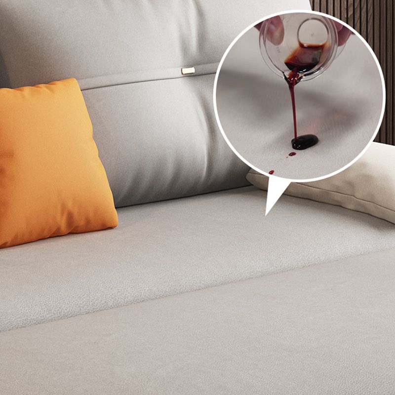 Glam Grey Futon Sleeper Sofa with Tufted Back and Storage in Faux Leather