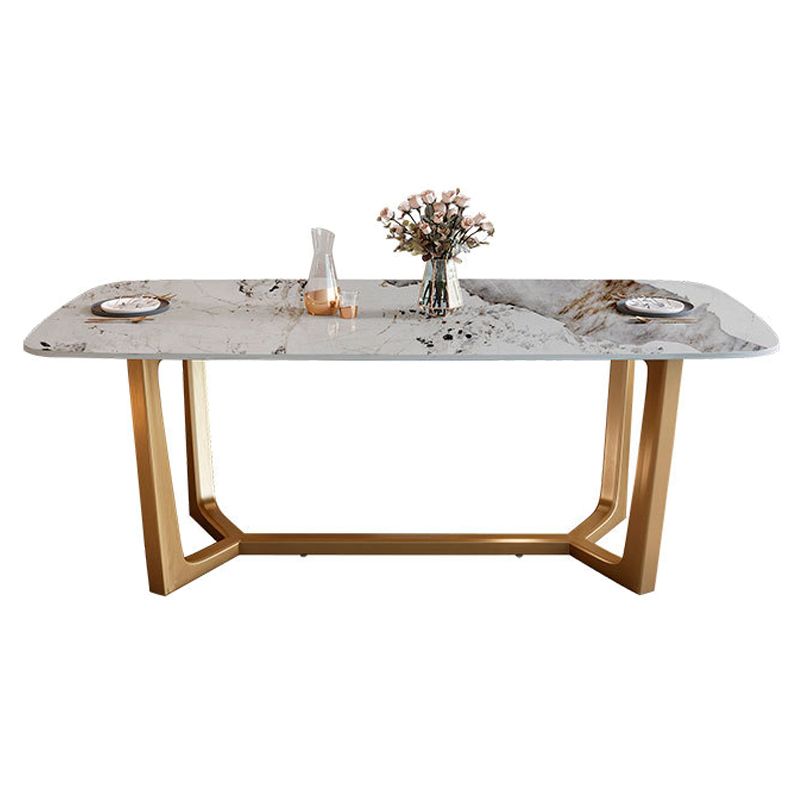 Mesa de comedor de piedra sinterizada de lujo tradicional mesa rectángulo con base de caballete dorado