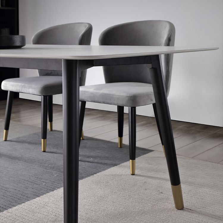 Mesa de comedor de lujo tradicional rectangular de piedra sinterizada mesa de comedor de 4 patas con marco negro
