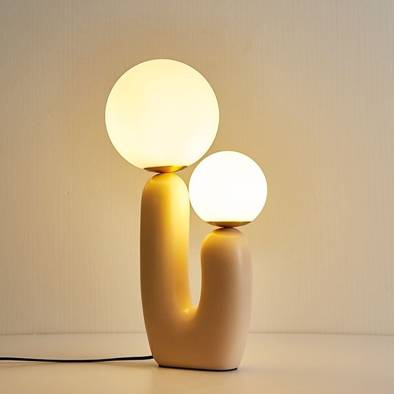 Lumière de table rose à 2 lumières dans la lampe de table en résine laquée de style créatif moderne avec nuance de verre globe