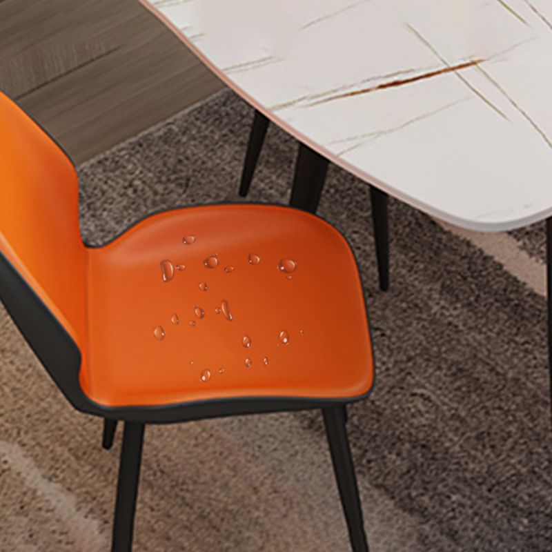 El comedor contemporáneo del metal preside el cuero de la PU que cena las sillas sin brazos para el uso interior