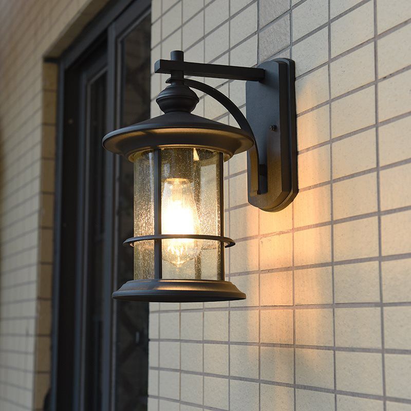 Cylindre en verre à graines à grève transparente Lodges légers 1-Bulb Lampe murale extérieure en noir / café pour jardin