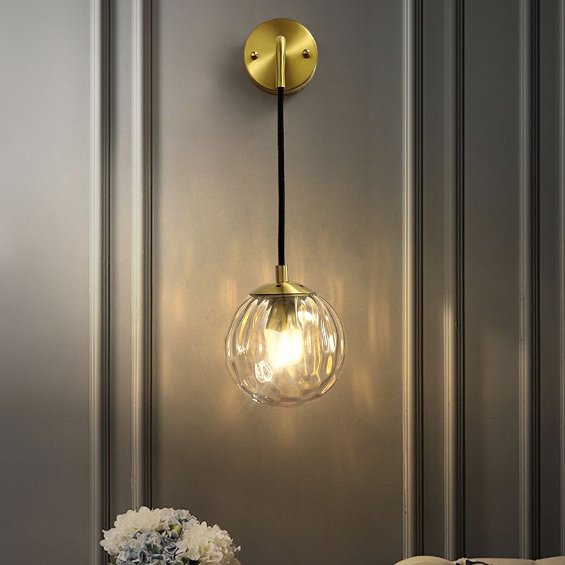 Clear Ripple Glass Ball Wall Light Minimalistic 1-Light Brass Sconce Fixture for Dining Room