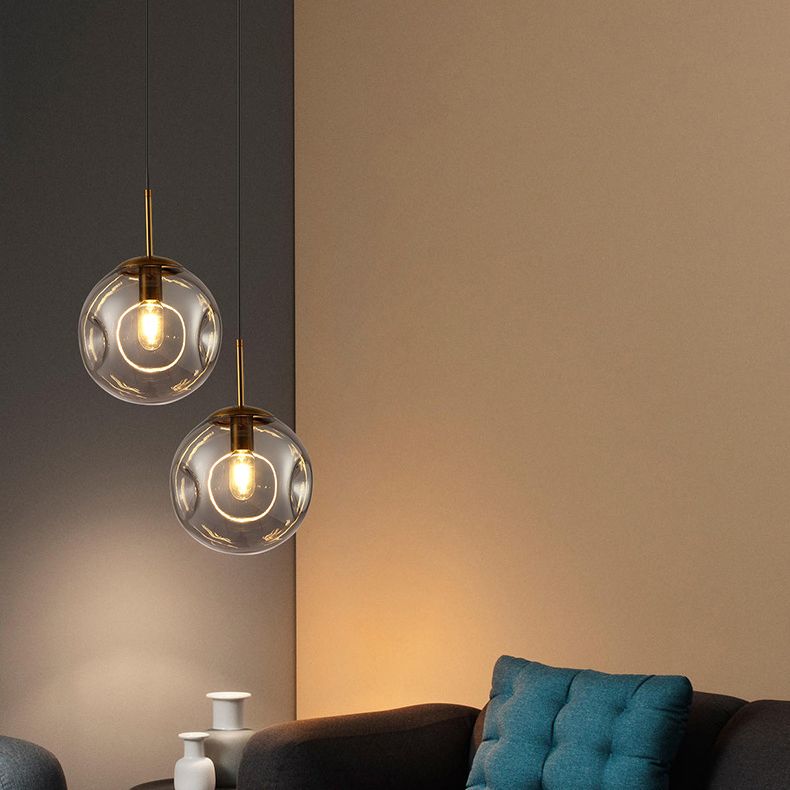Lámpara de colgación esférica de vidrio con hoyuelos simplicidad de acabado de latón de la cabeza para cenar para cenar