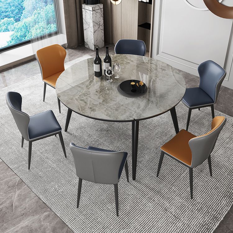 Mesa de cocina redonda extensible de piedra sinterizada Mesa de comedor moderna con 4 patas