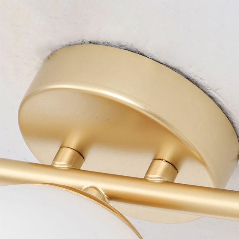Modern Metal Wall Sconce Ball Shape Wall Light with Glass Shade for Bedroom in Gold