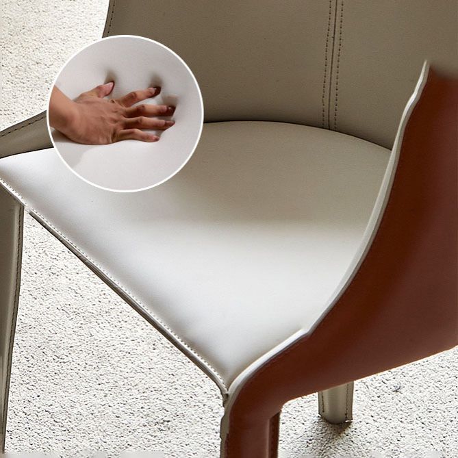 Silla de comedor contemporánea de cuero Silla de comedor de metal con respaldo sólido con brazo