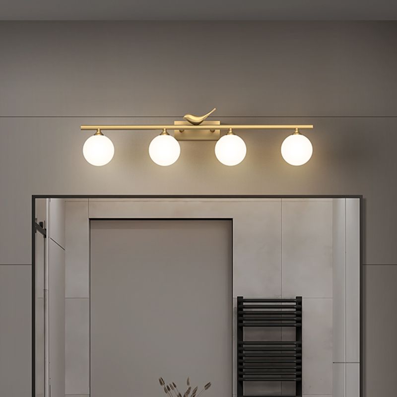 Ball Bathroom Vanity Sconce Opal Glass Postmodern Wall Light with Bird Decor in Brass