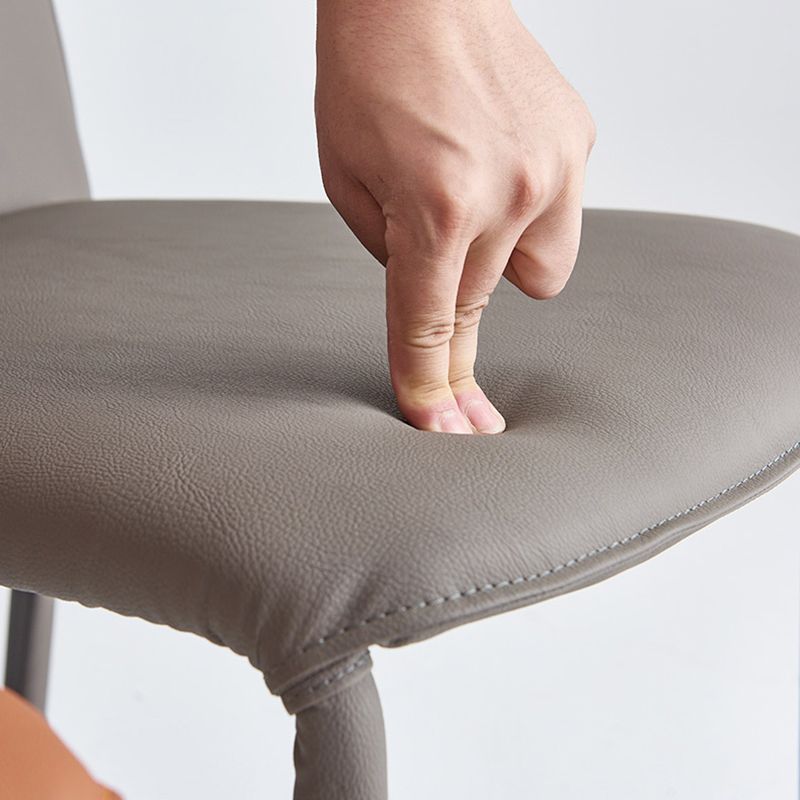 Sillas de comedor de cuero de estilo moderno, silla lateral apilable con respaldo sólido para uso doméstico (juego de 2)