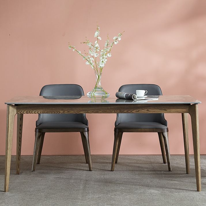 Midden-eeuwse moderne rechthoek eettafel grijs gesinterde stenen tafel met 4 as massief houten benen