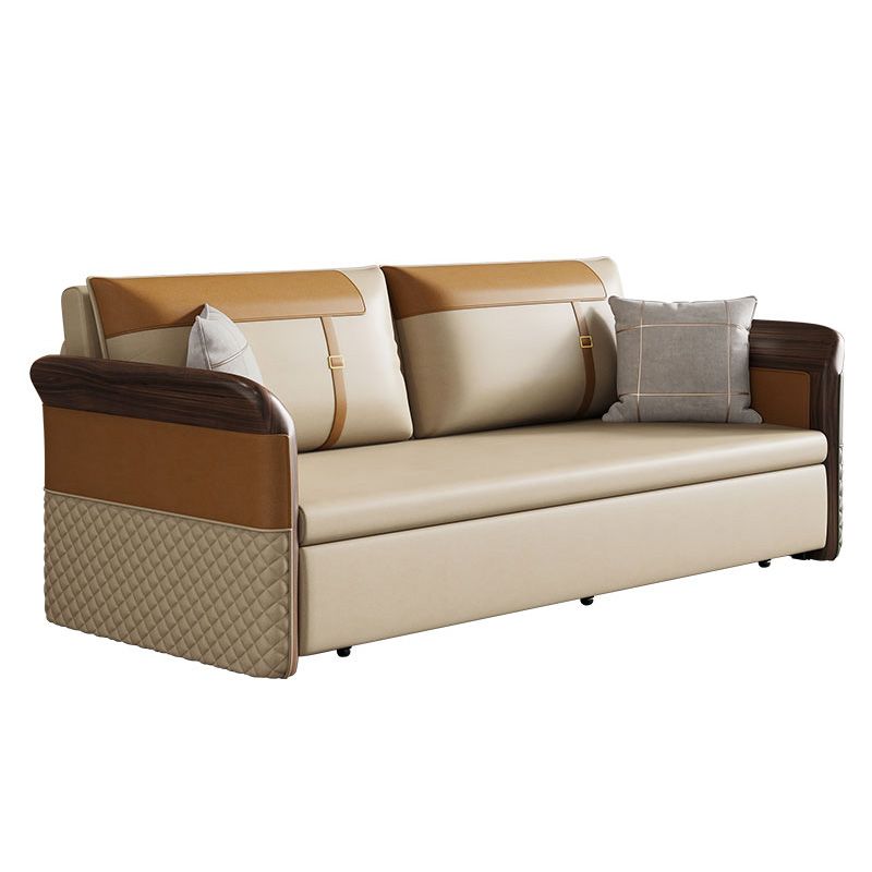 Contemporary Bonded Leather Sleeper Sofa with Pillow Back and Flared Arms