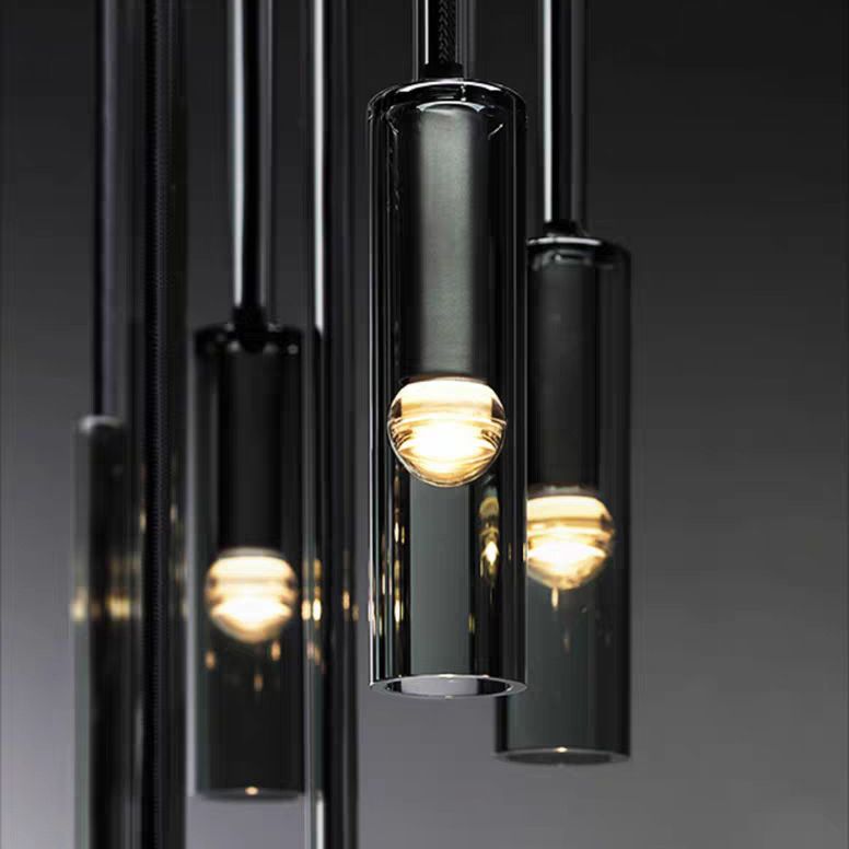 Luce a sospensione grigio in cristallo in moderna lampada a sospensione cilindrica di rame per sala da pranzo