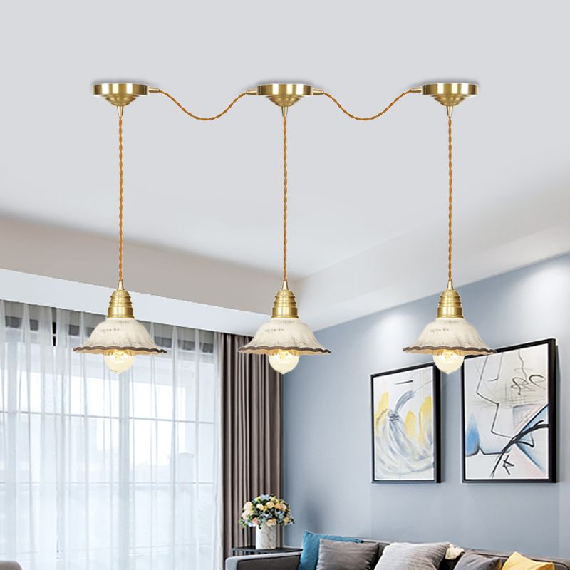 Light sospeso a sospensione multipla tradizionale 3/5/7 bulb Lampada sospensione in oro con progettazione di connessioni in serie