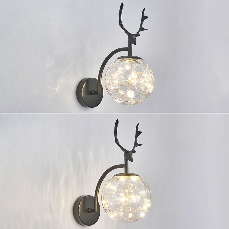 Glass Globe LED Wall Lamp in Modern Fashionable Wrought Iron Wall Sconce with Antler Decoration
