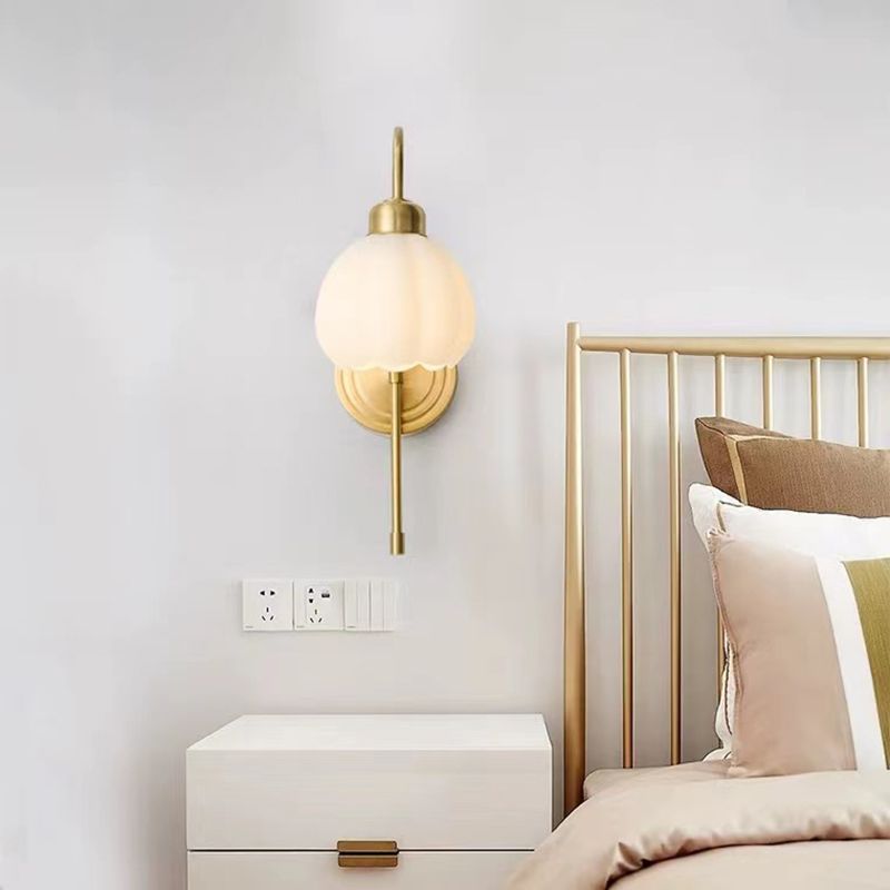 Modern Metal Wall Sconce Bud Shape Wall Light with Glass Shade for Bedroom in Gold