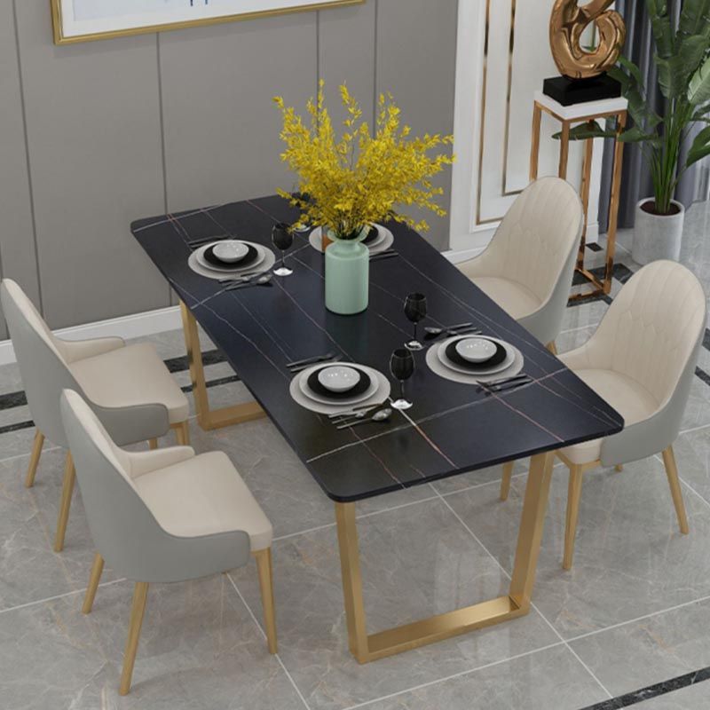 Mesa de cocina rectangular de lujo con superficie de piedra sinterizada y pedestal doble en dorado