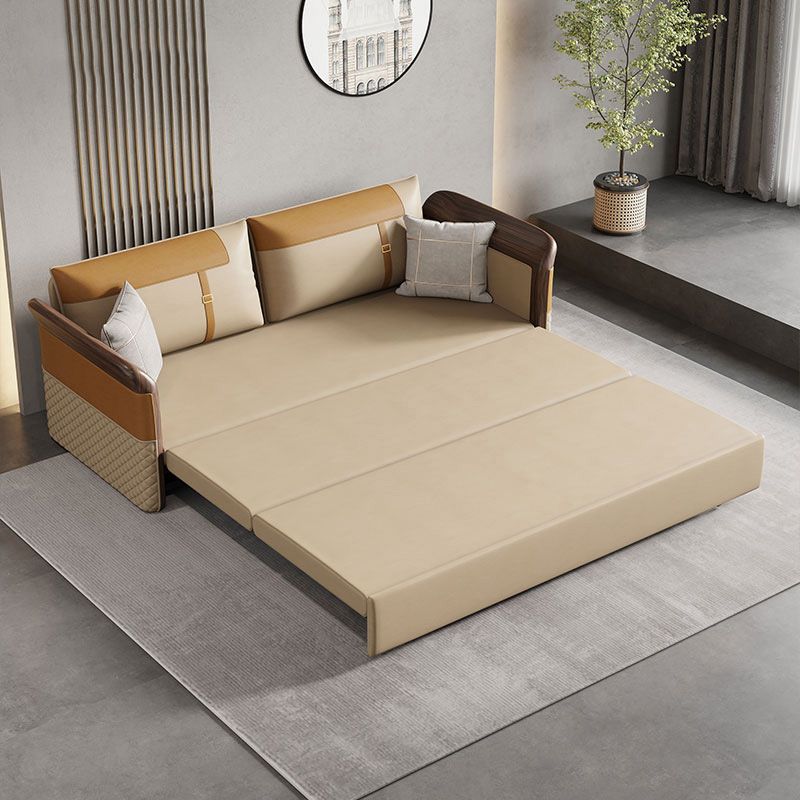 Contemporary Bonded Leather Sleeper Sofa with Pillow Back and Flared Arms