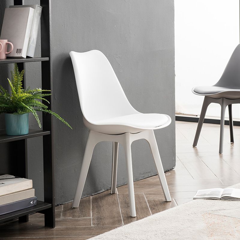 Minimalistischer Stil Plastik Ess -Armless Stuhl Polsterte feste Rückenstühle für Zuhause gepolstert
