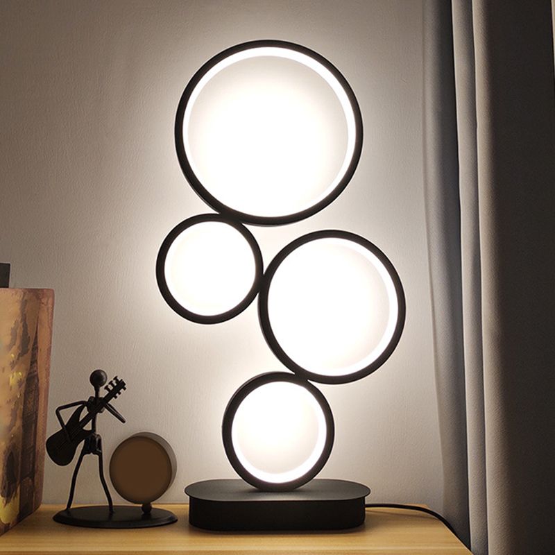 Lampada da tavolo rotonda semplice Implesatura Metallic LED Illuminazione notturna con piedistallo circolare in luce nera, calda/bianca