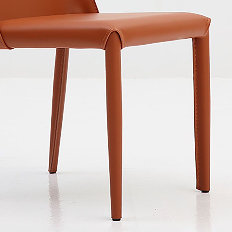 Silla de comedor de cuero sin brazos contemporánea Sillas de comedor de metal