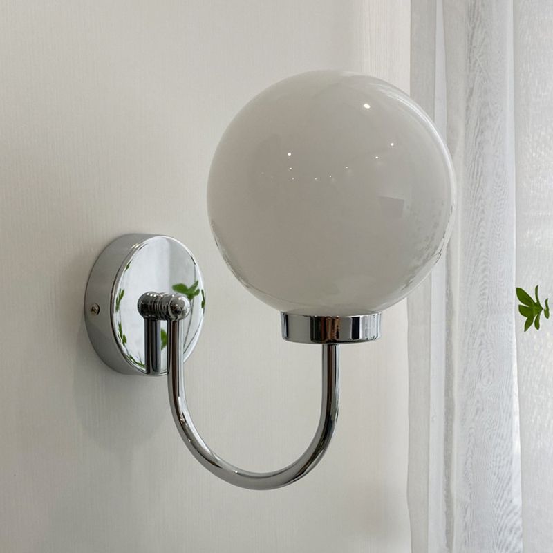 Luz de pared de globo de vidrio en un estilo creativo moderno Lámpara de pared de hierro forjado para espacios interiores