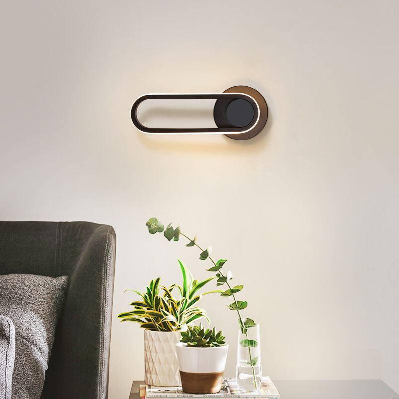 Lacquered Iron Black LED Wall Sconce in Modern Concise Style Silicone Oval Rotatable Wall Lamp