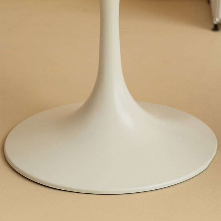 Eigentijdse eettafel van gesinterd steen met ronde vorm, keukeneettafel met tulponderstel
