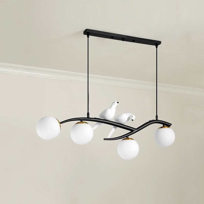 Glass Globe Island Light in Modern Singularity Wrought Iron Pendant Light with Resin Bird Decoration