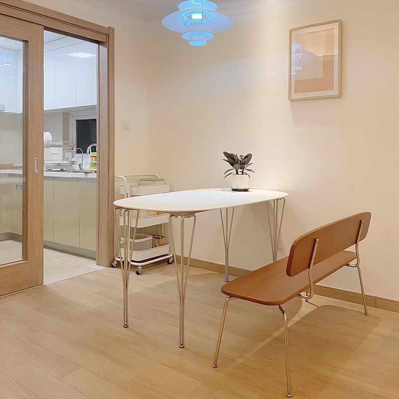 Modern White Sintered Stone Dining Table Oval Shape Standard Dining Table with 4 Legs Base