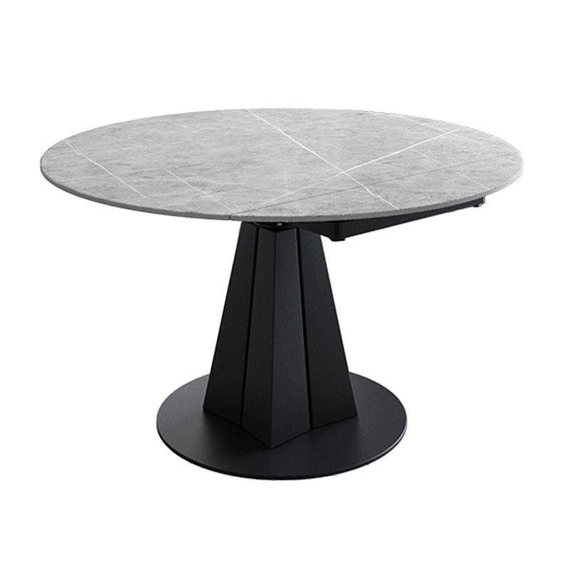 Table à manger en pierre fritrée de style moderne avec piédestal