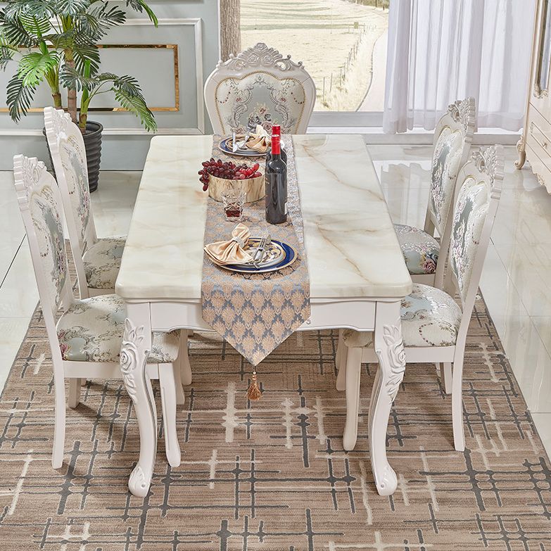 Juego de mesa de mármol victoriano de 5/7 con mesa rectangular de comedor con cávidos con sillas textiles