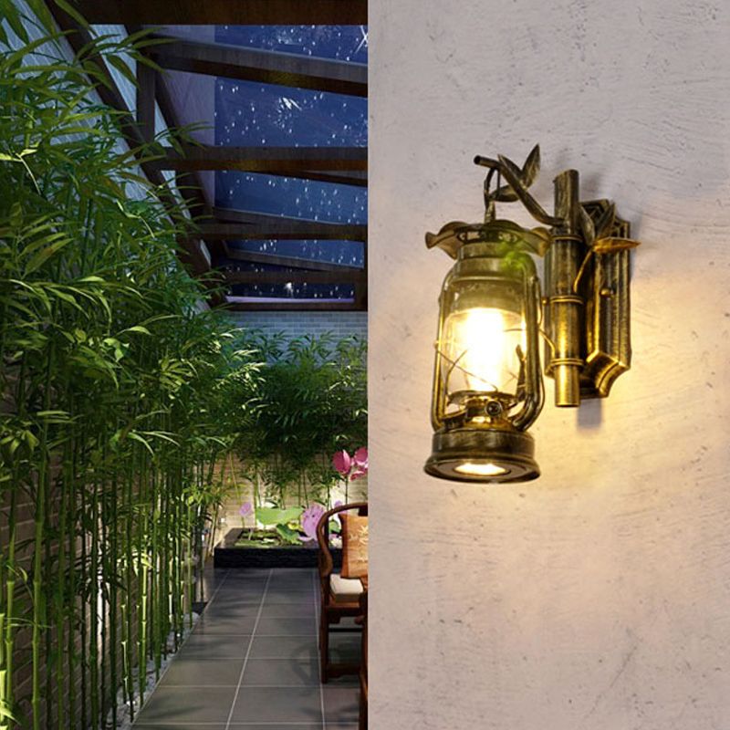 Industrial Lantern Sconce 1 Head Clear Glass Wall Mount Light Fixture in Bronze/Copper with Metal Bamboo Backplate