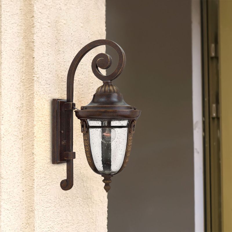 Scrolling Arm Metal Wall Lamp Rustic 1 Light Outdoor Sconce in Bronze with Seedy Glass Shade
