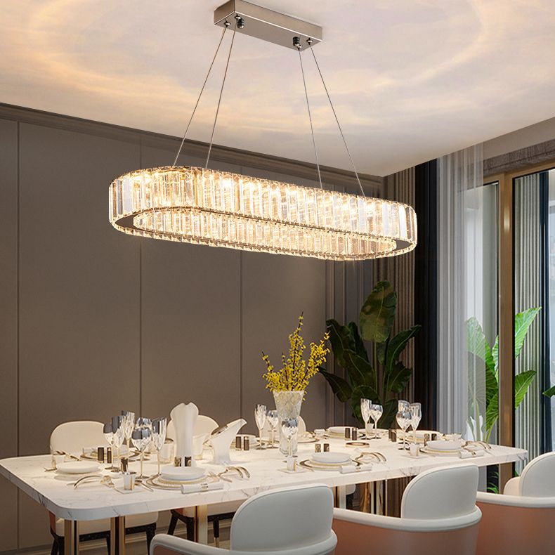 Luz de la isla LED cromada ovalada en la moderna lámpara colgante de acero inoxidable de estilo de lujo con sombra de cristal