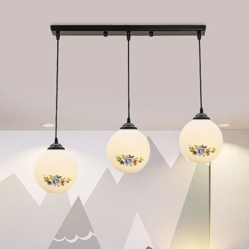 3 Heads Orb Multi-Pendant Modernism Black Finish White Frosted Glass Hanging Light Kit with Flower Pattern and Round/Linear Canopy