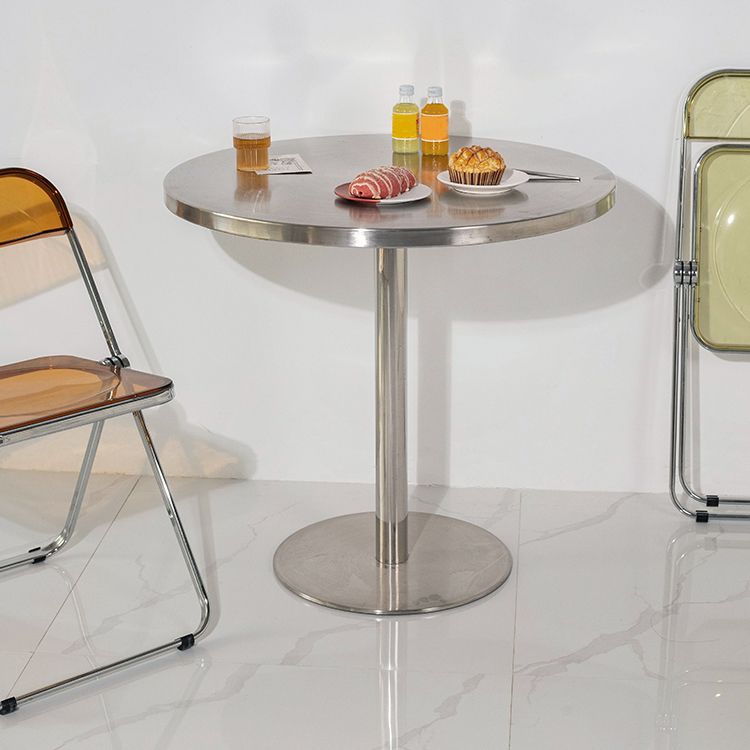 Mesa de comedor con astillas de metal Mesa de comedor de acero inoxidable con base de pedestal