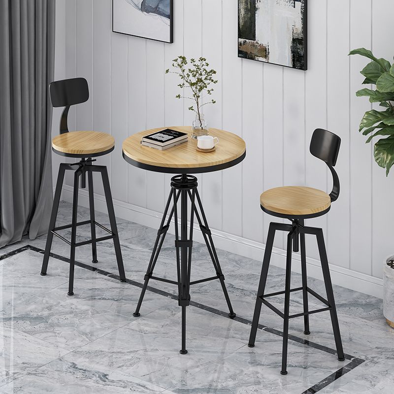 Industrielle höhenverstellbare schwarze Barhocker aus Eisen und Holz mit rundem Sitz