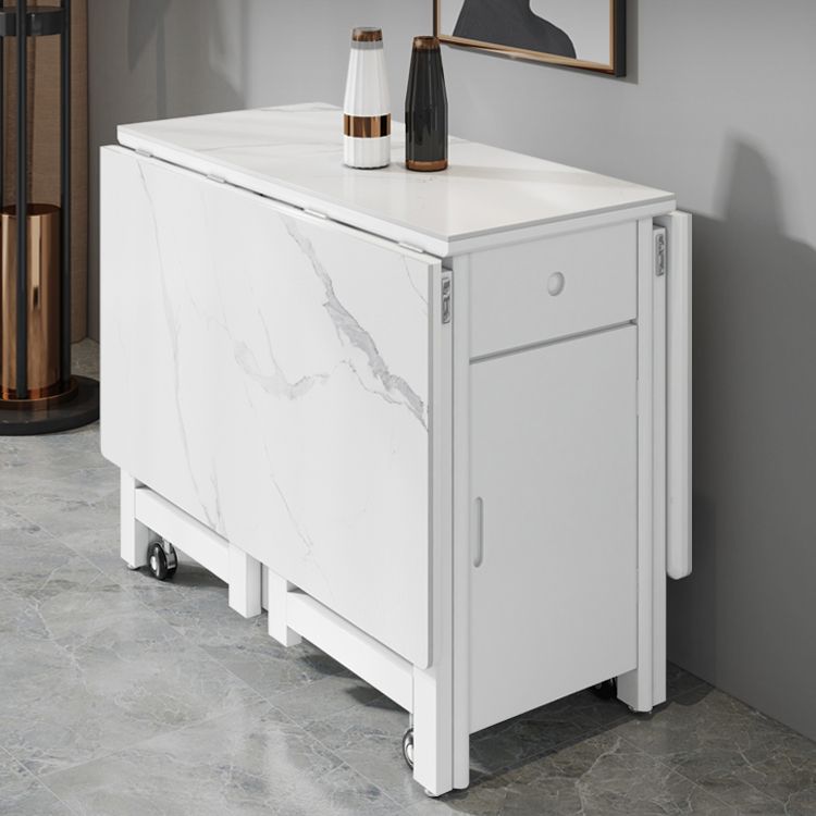 Mesa de comedor de piedra sinterizada de estilo contemporáneo con hoja blanca y base de caballete