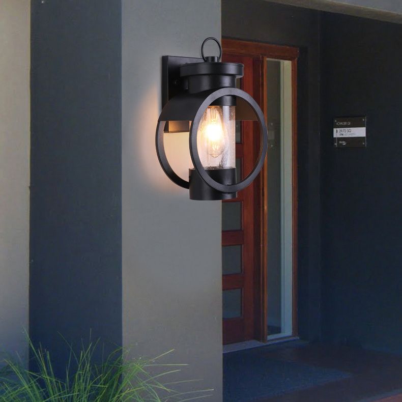 Industrial Style Black Wrought Iron Wall Sconce with Seeded Glass Cylinder Shade Single Bulb Outdoor Lighting Fixture