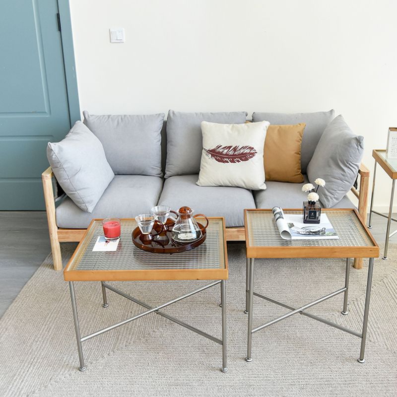 Scandinavian Glass Coffee Table with Wood Accents Cross Legs Cocktail Table